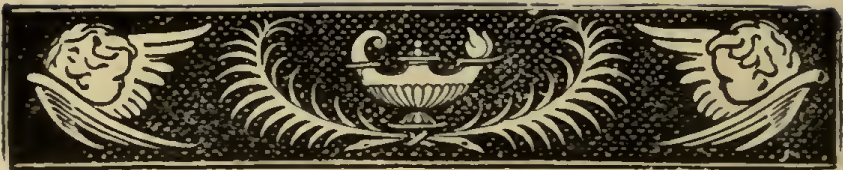ornamental header with lamp and cherub heads