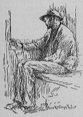 A man sits by a window.