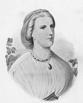 portrait of a woman with hair braided into a crown wearing a simple white top.