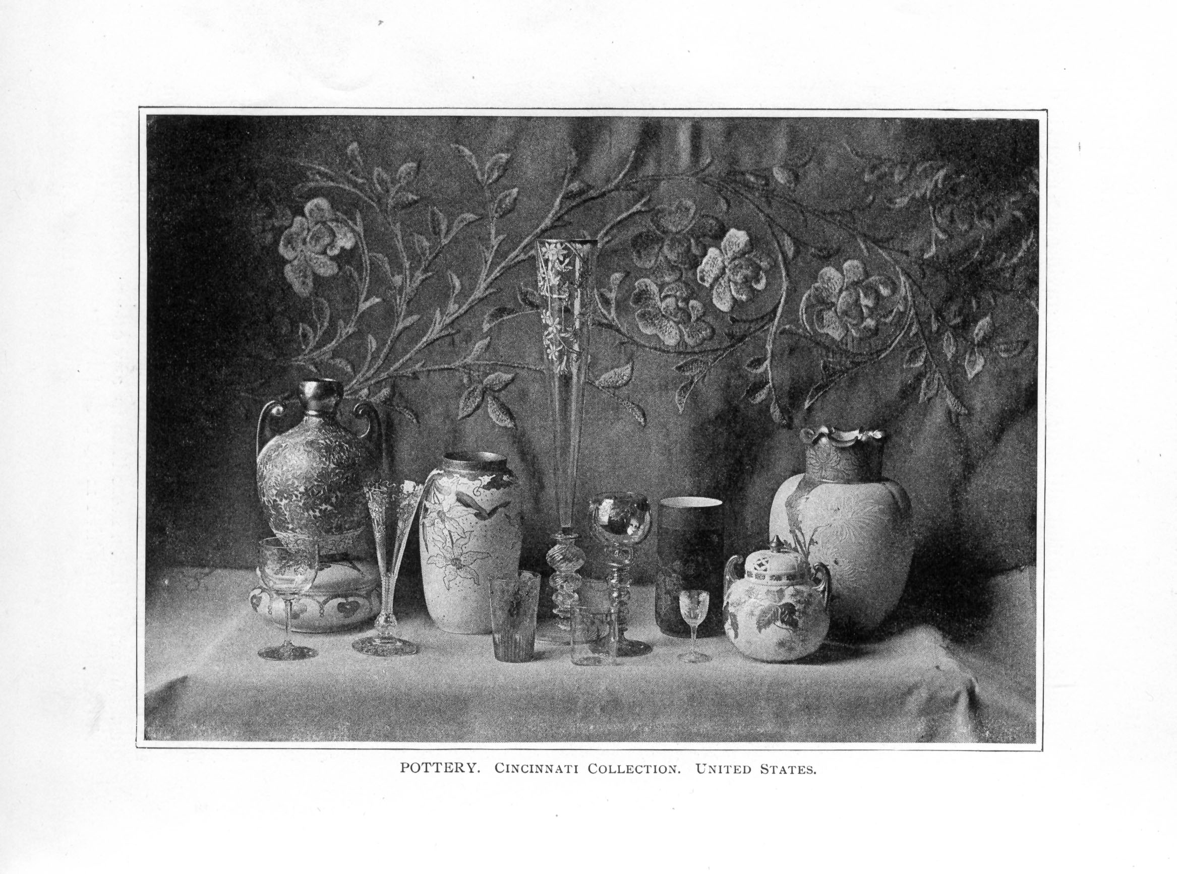 five vases decorated with floral motifs and one vase, four chalices, and two cups, all made of glass