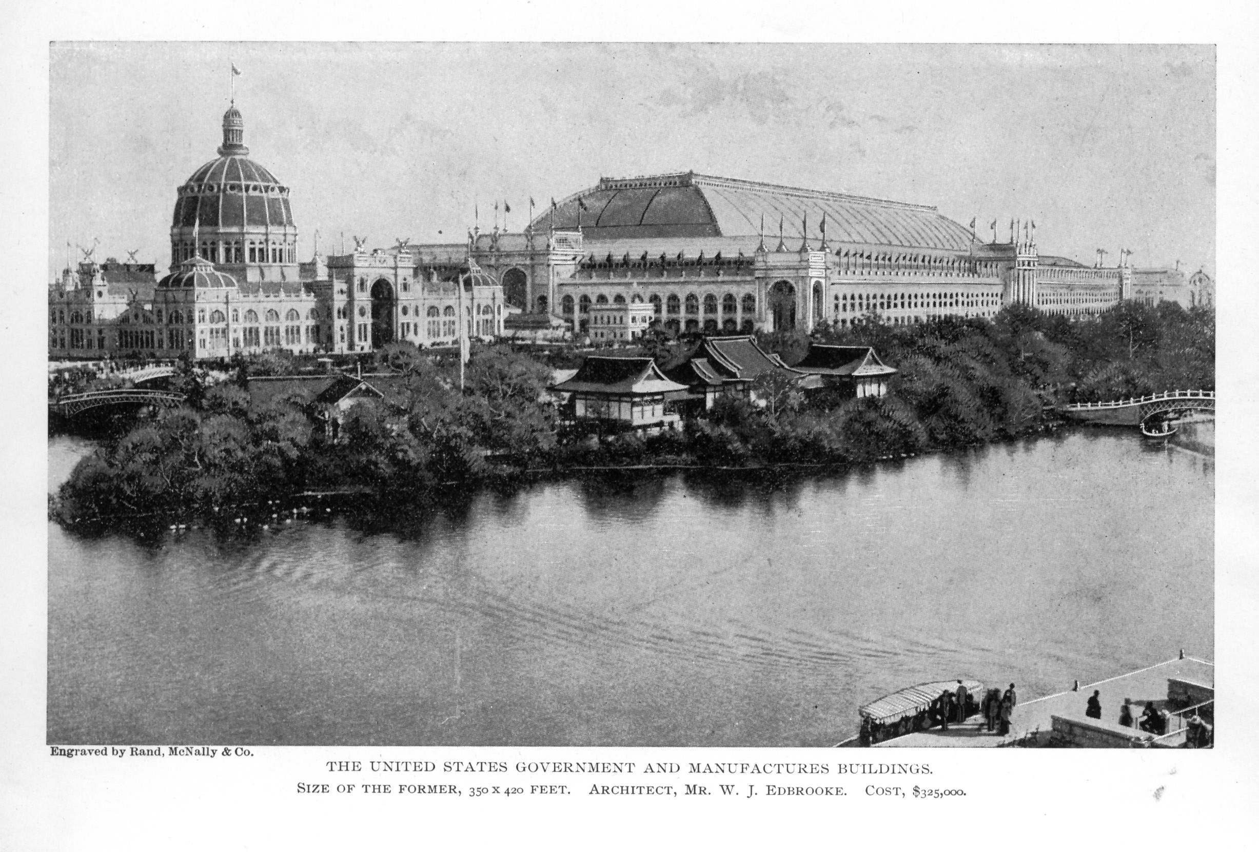 large ornate building with domed roofs, built along waterfront