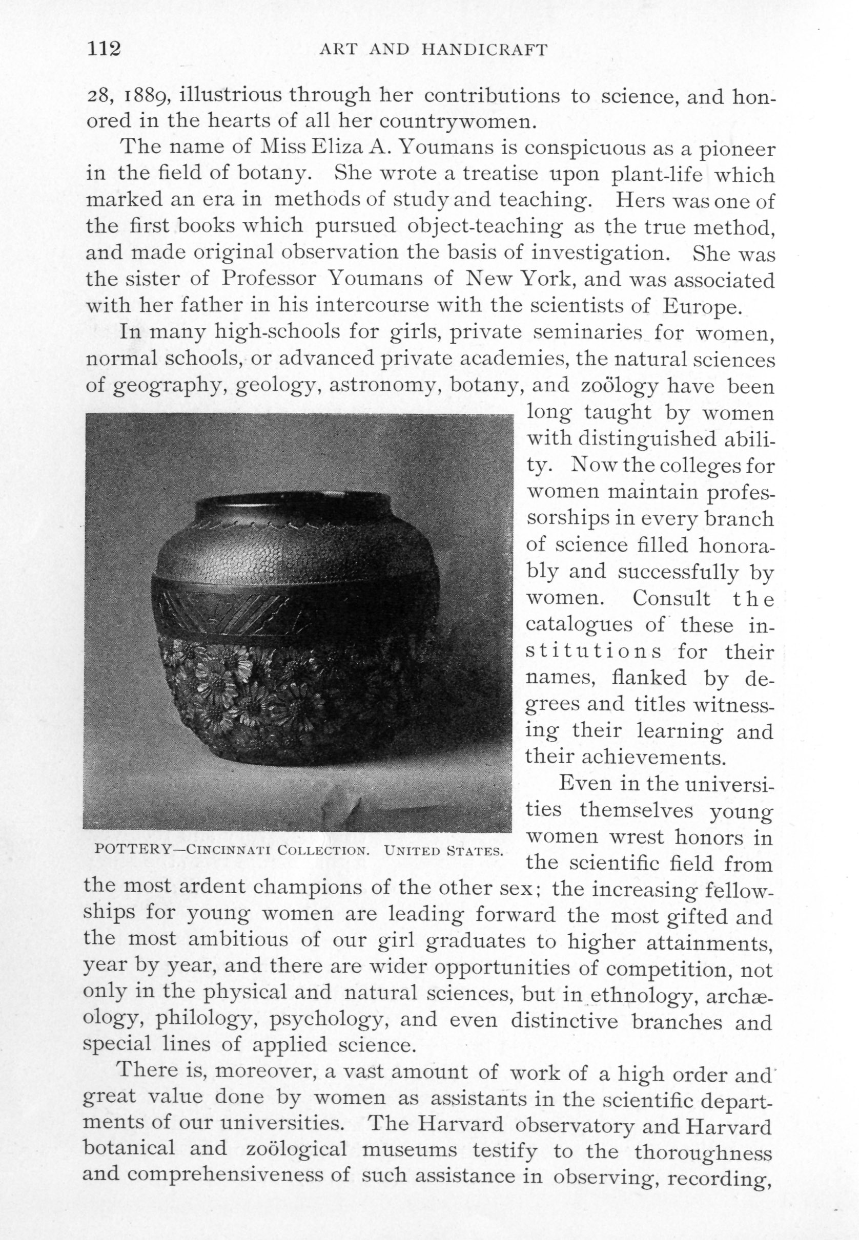 vase decorated with three-dimensional flowers and engraved geometric shapes