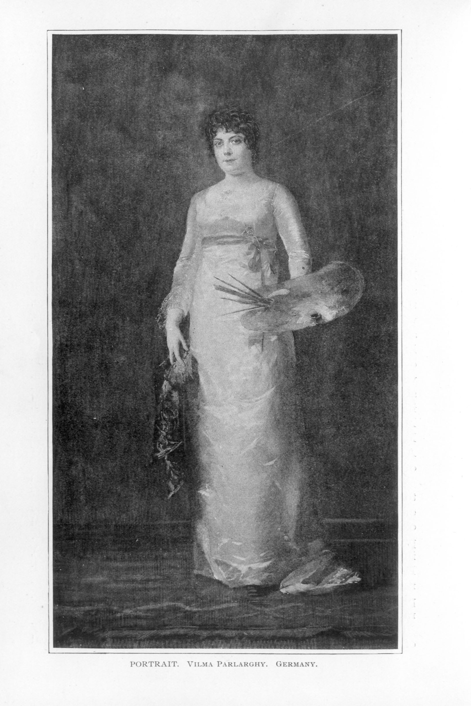 standing woman holding a palette and paintbrushes