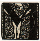 M (illuminated capital) with person behind the center of the letter M