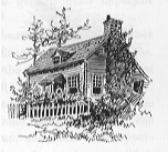 Lovely cottage with white picket fence and trees all around.