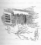 Detail of doorway of the snowy cabin.