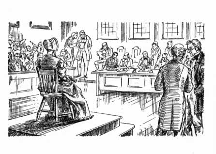 A woman sits in a courtroom