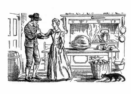 A man and woman stand together in a kitchen